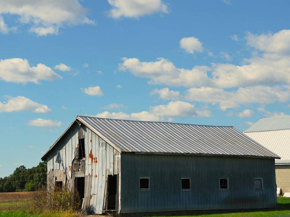 Metal shop building on ranch land